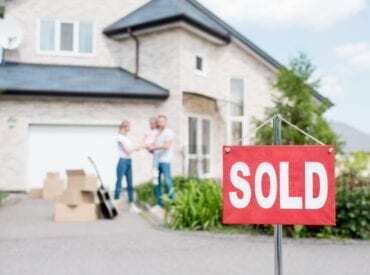 Happy family benefitting from strong york region real estate. York region real estate sales have been the strongest they've been in over 10 years. Find out how in this article.