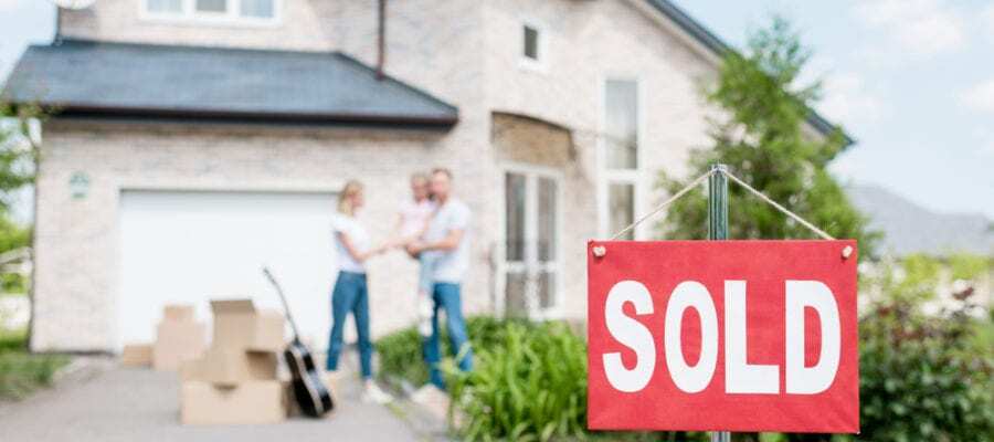 Happy family benefitting from strong york region real estate. York region real estate sales have been the strongest they've been in over 10 years. Find out how in this article.