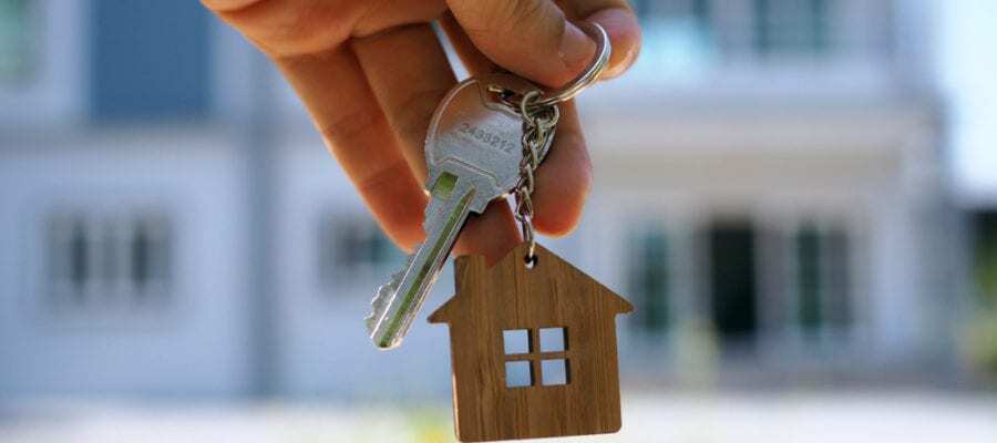 hand holding keys for new home