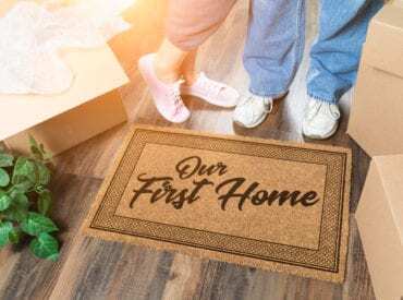 a door map with caption our first home with two pairs of feet