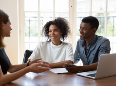 couple, sitting, with, woman, talking,